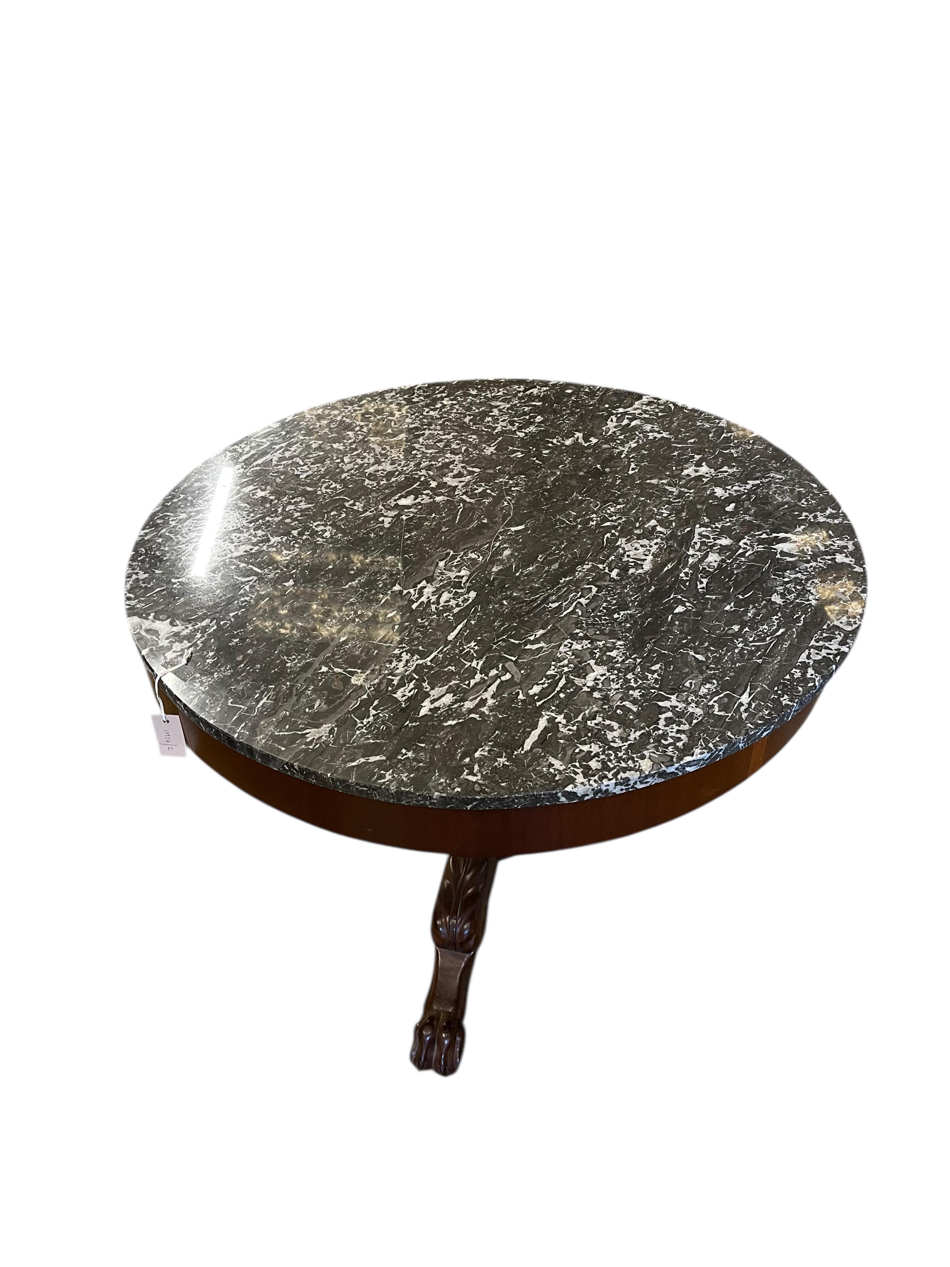 A French circular mahogany marble topped centre table, diameter 100cm, height 70cm
